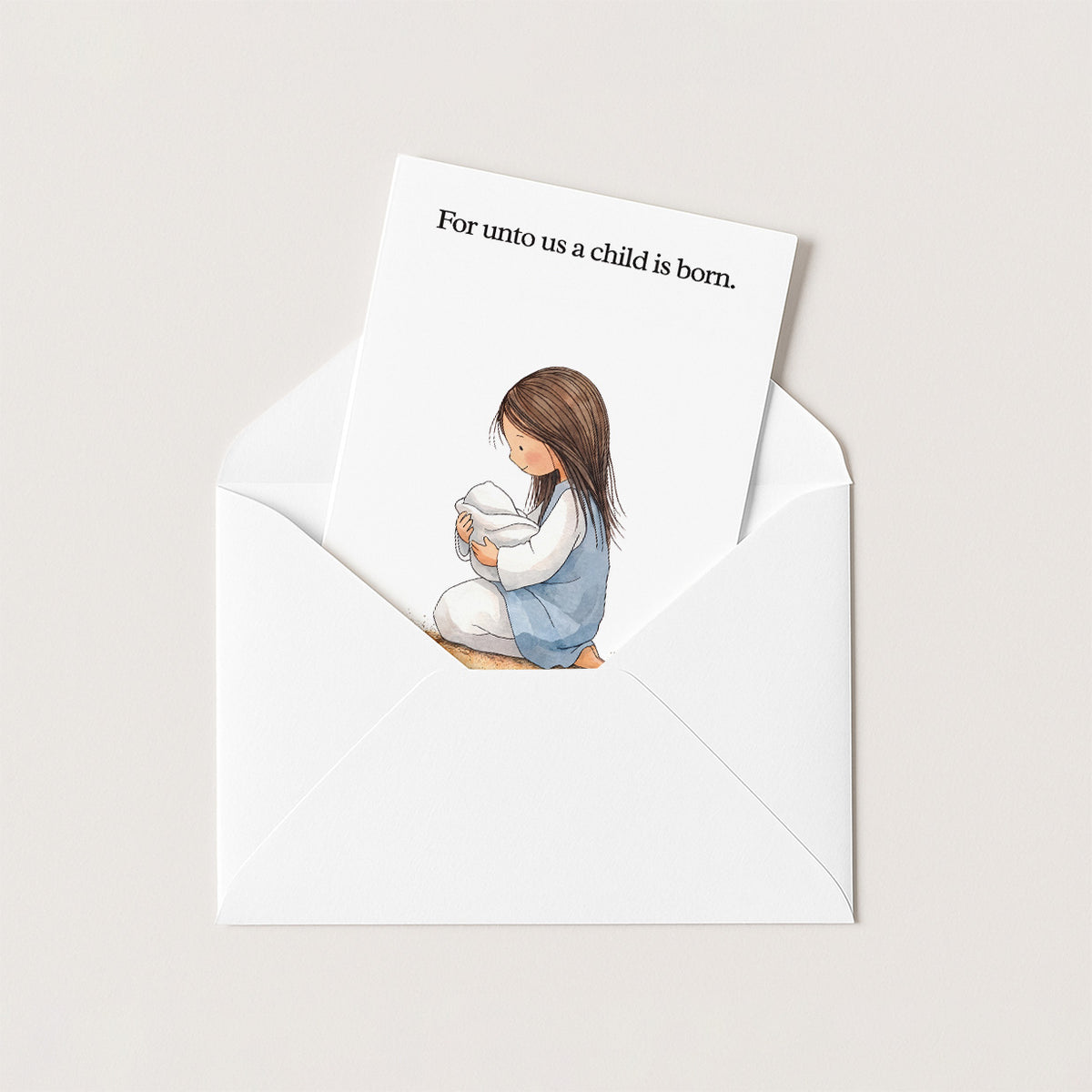 Christmas card with its white envelope
