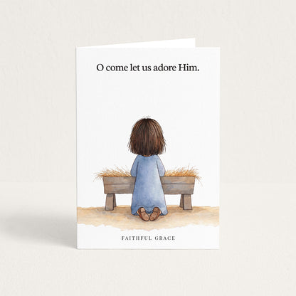 Christmas card reading "O come let us adore Him."