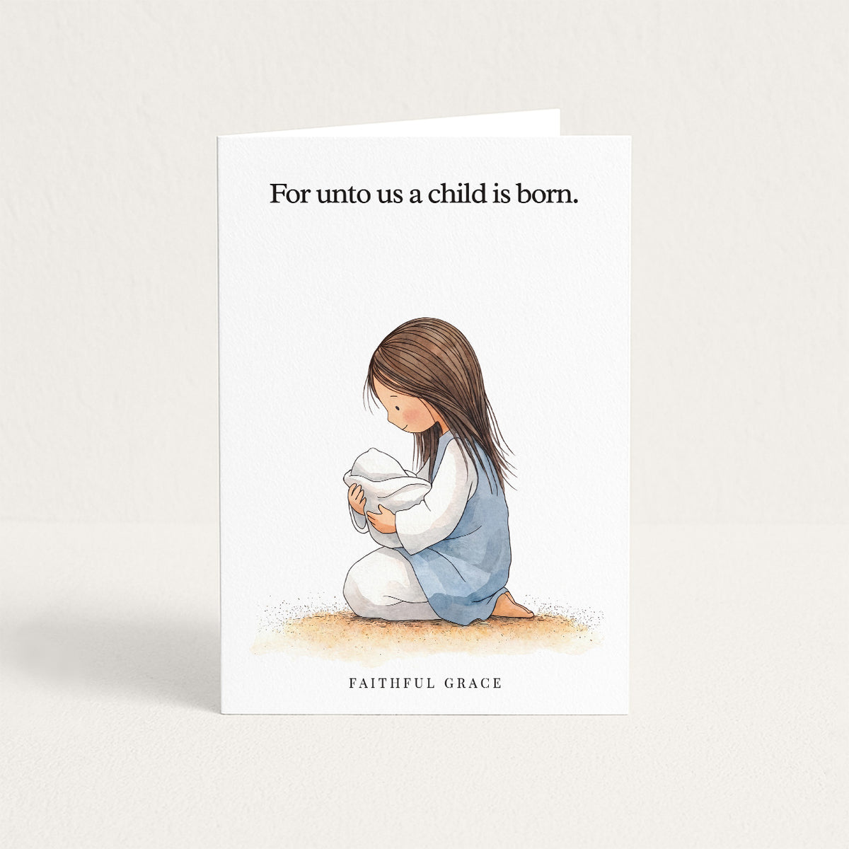 Christmas card reading "For unto us a child is born."