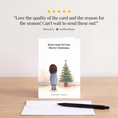 The Jesus came for you card on a table with a white envelope. Review: "Love the quality of the card and the reason for the season! Can't wait to send these out!" Patricia S.