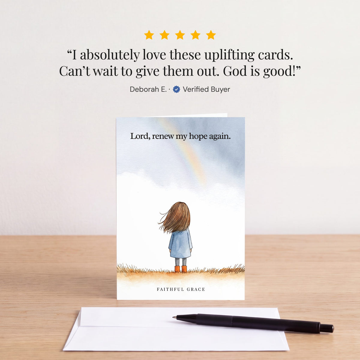 The Renew my hope again card on a table with a white envelope. Review: "I absolutely love these uplifting cards. Can’t wait to give them out. God is good!" Deborah E.