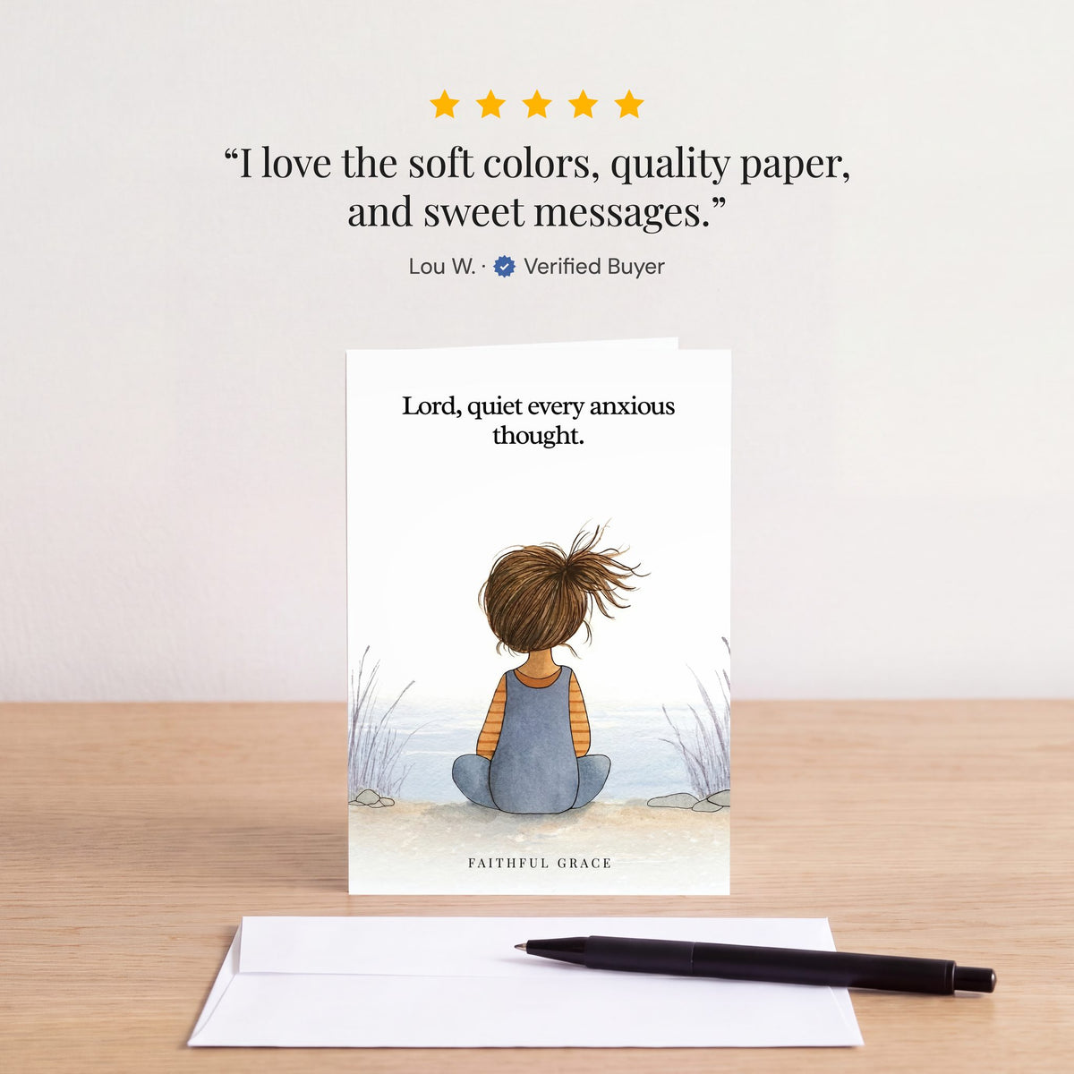 The Quiet every anxious thought card on a table with a white envelope. Review: "I love the soft colors, quality paper, and sweet messages." Lou W.