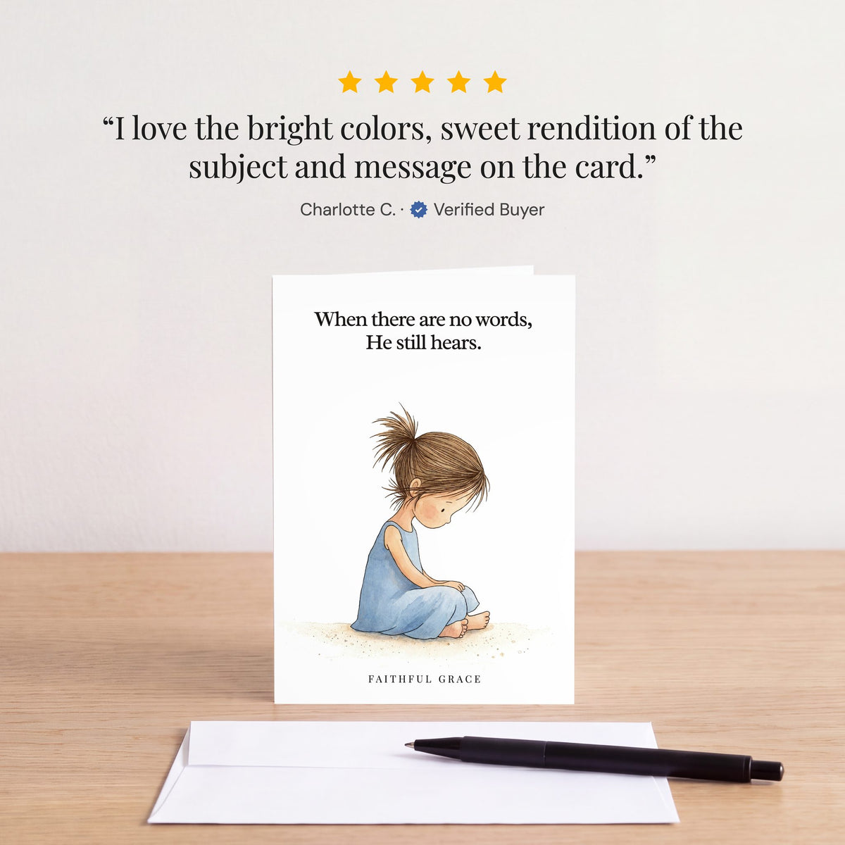 The He still hears card on a table with a white envelope. Review: "I love the bright colors, sweet rendition of the subject and message on the card." Charlotte C.