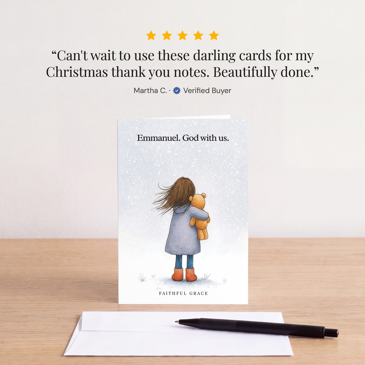 The Emmanuel. God with us card on a table with a white envelope. Review: "Can't wait to use these darling cards for my Christmas thank you notes. Beautifully done." Martha C.