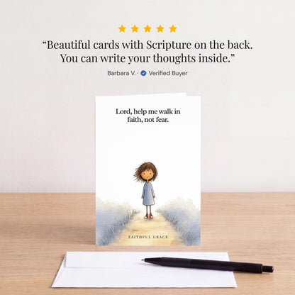 The Help me walk in faith, not fear card on a table with a white envelope. Review: "Beautiful cards with Scripture on the back. You can write your thoughts inside." Barbara V.