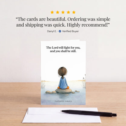 The The Lord will fight for you card on a table with a white envelope. Review: "The cards are beautiful. Ordering was simple and shipping was quick. Highly recommend!" Danyl E.
