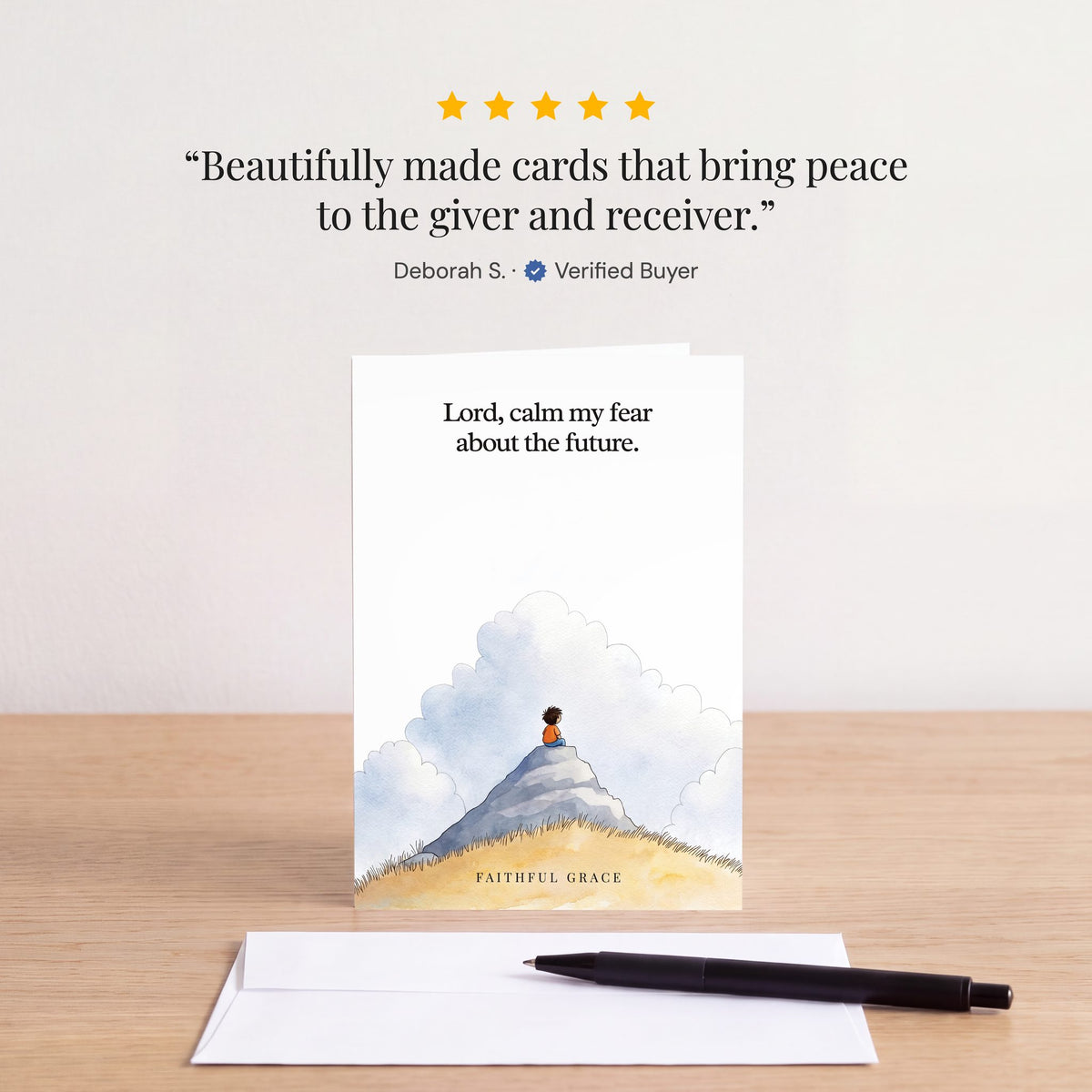 The Calm my fear about the future card on a table with a white envelope. Review: "Beautifully made cards that bring peace to the giver and receiver." Deborah S.
