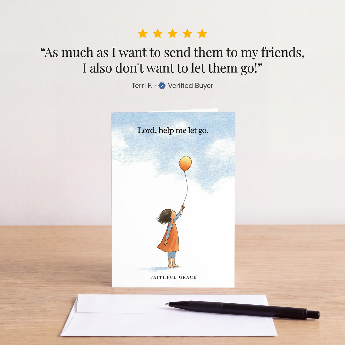 The Help me let go card on a table with a white envelope. Review: "As much as I want to send them to my friends, I also don't want to let them go!" Terri F.