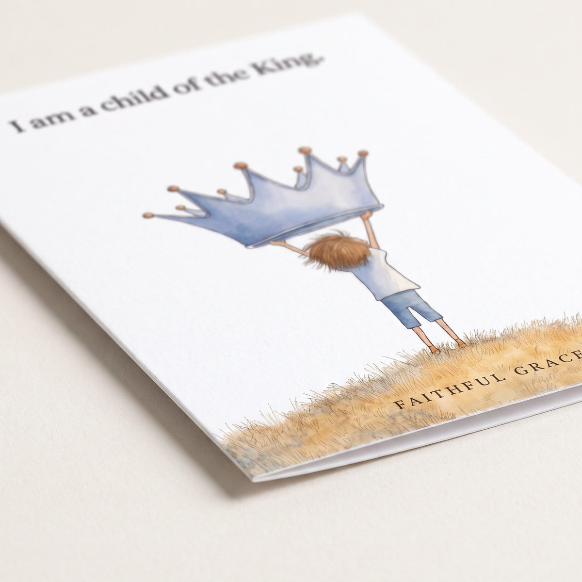 Close-up of the Child of the King card showing the smooth matte finish and fold