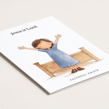Close-up of the Jesus is Lord card showing the smooth matte finish and fold