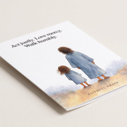 Close-up of the Justly. Mercy. Humbly card showing the smooth matte finish and fold