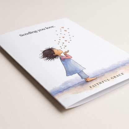 Close-up of the Sending you love card showing the smooth matte finish and fold