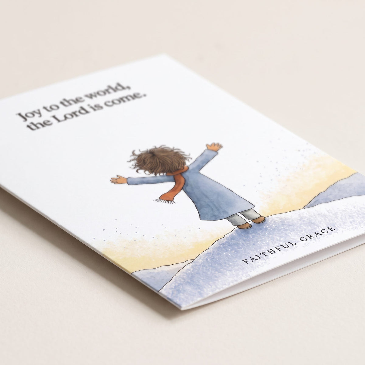 Close-up of the Joy to the world card showing the smooth matte finish and fold