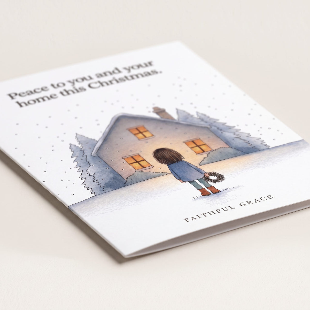 Close-up of the Peace to you and your home card showing the smooth matte finish and fold
