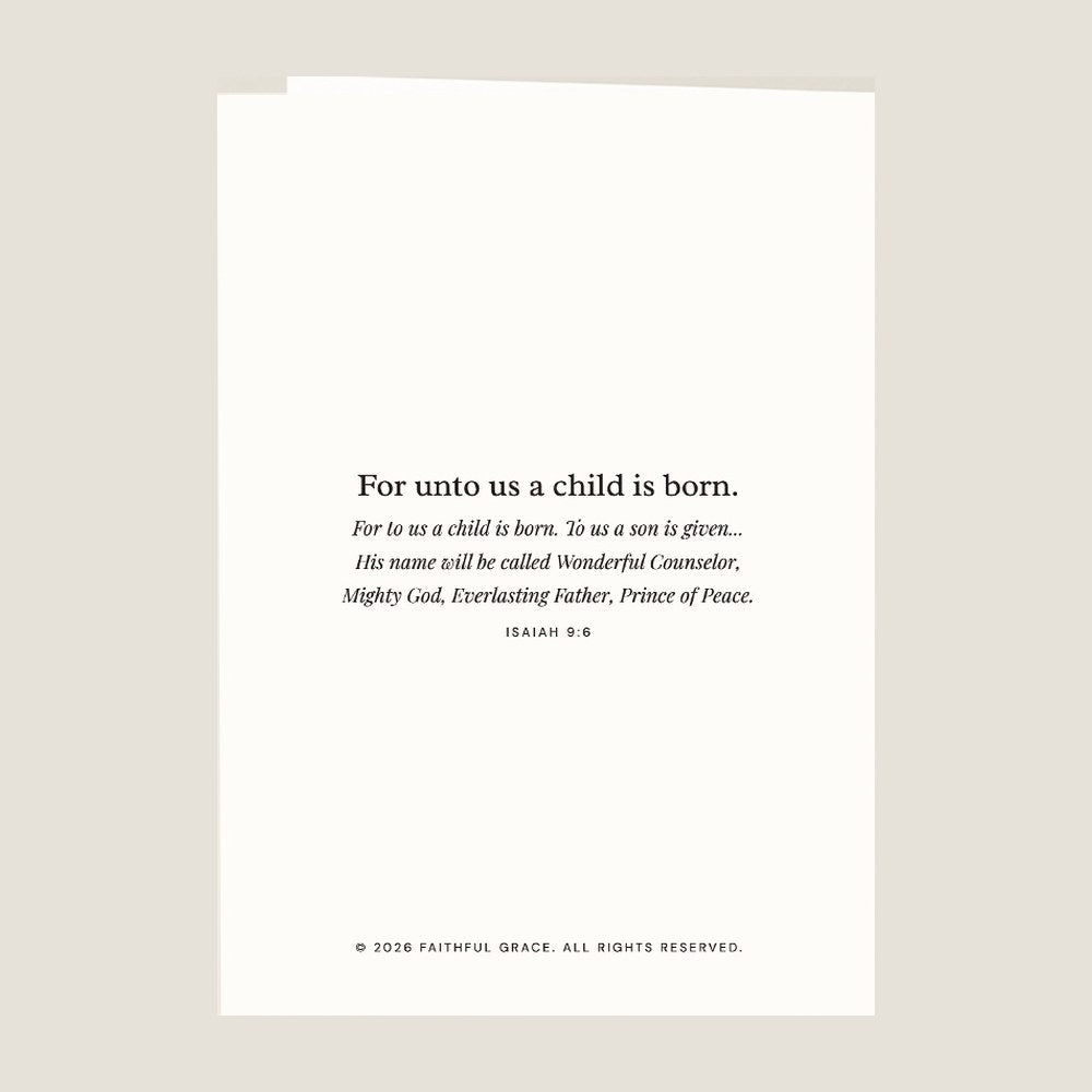 Back of the card, with the Bible verse behind For unto us a child is born.